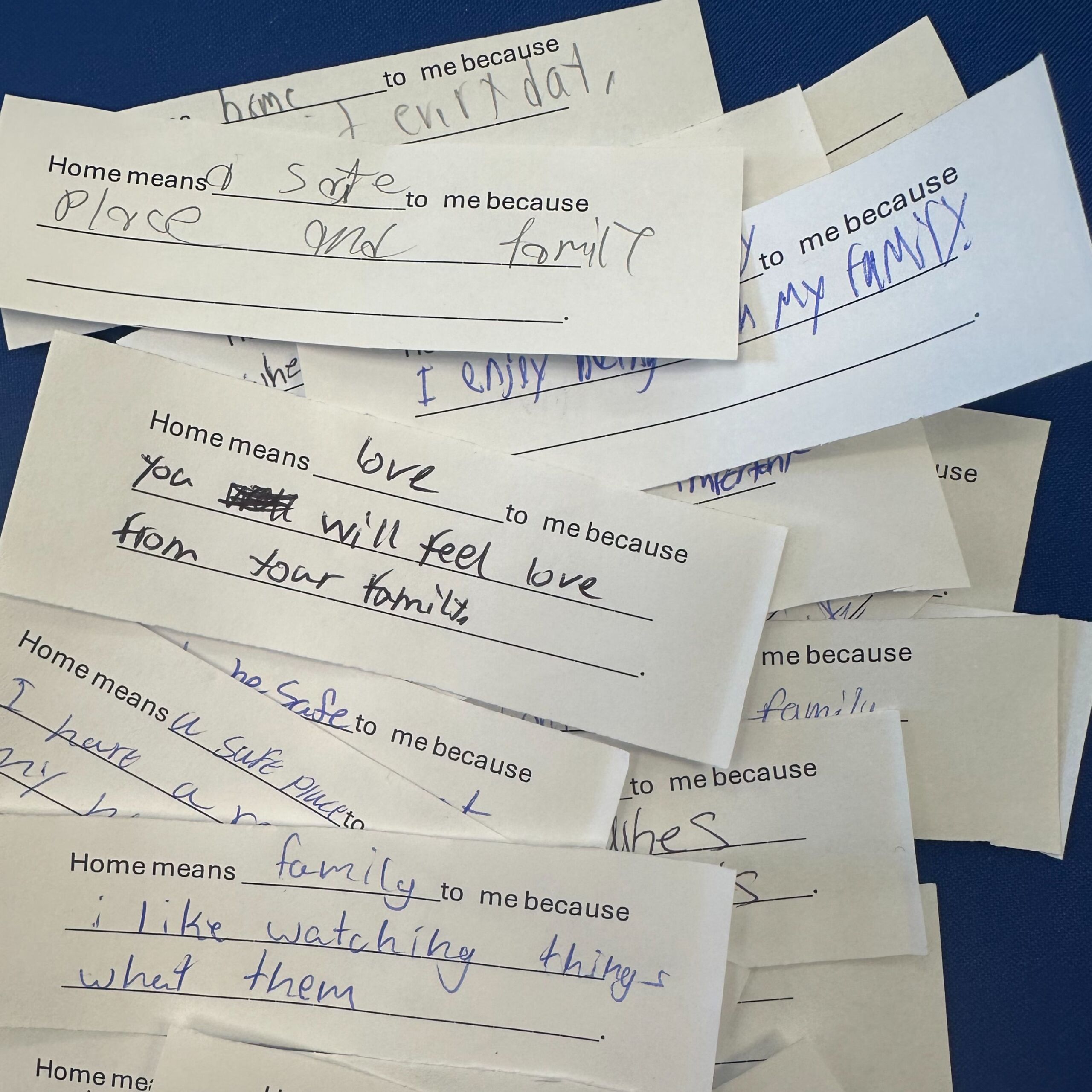 Students reflecting on what 'home' means to them and signing a Kindness Pledge to treat others with compassion during SSMV's Homelessness Awareness Event.